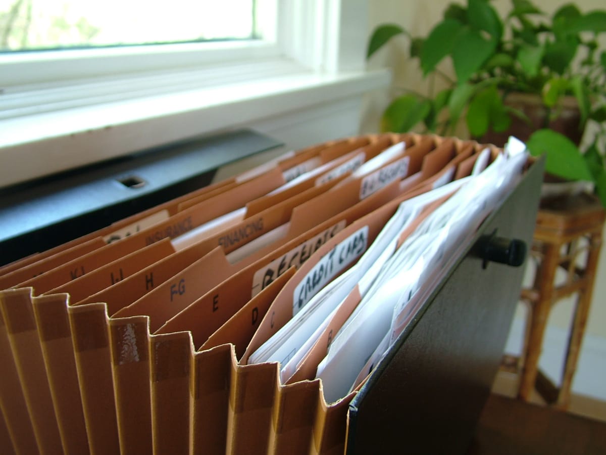 "Paperwork file" by IN 30 MINUTES Guides is licensed under CC BY 2.0. To view a copy of this license, visit https://creativecommons.org/licenses/by/2.0/?ref=openverse.